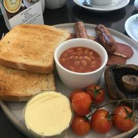 Vegan breakfast; vegan sausages & bacon, mushrooms, baked beans, vine tomatoes and toast with vegan spread at Cool River Cafe in Matlock