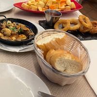 Patatas Bravas, Onion Rings, Bread  at Tapas 75 in Fuerteventura