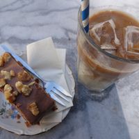 carrot cake w cinnamon frosting & Ice Coffee w soy milk at Piece Of Cake in Maastricht