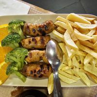Veggie sausage with chips, rice, veggies and salad. at Restaurante Fojo dos Lobos in Fafiao