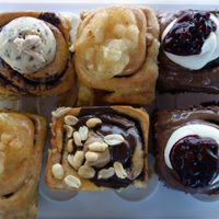 All vegan! Top from left to right: cookie dough chip choc, apple, and cherry choc rolls
Bottom from left to right: apple, snicka, and cherry choc rolls  at Cinnamood in Saarbrucken