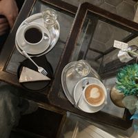 Coffee with oat milk & vegan carrot cake  at Aufzug Café in Vienna