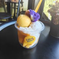 Tasty ripe mango, coconut sticky rice, mango and coconut ice cream and crispy rice cake. + Butterfly pea flower at COCO MANGO - Prapokkloa Rd in Chiang Mai