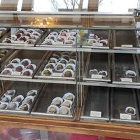 Beautiful vintage looking counter with Chocolatey treasures inside at Lait De Choco in Amsterdam