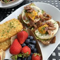 Avocado toast breakfast platter! Came with mango or orange juice.   at A Lo Vegano in Orlando