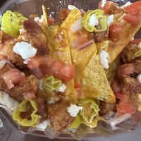 Half size Stomper Nachos  at Beach Hut Deli & Tap Room by DOCO in Sacramento