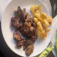 Seitan and potatoes  at Nanda's in Lucca