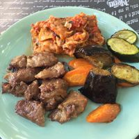 Mixed ‚small‘ plate - choose 3 dishes from menu: lasagna, antipasti veggies, seitan in red wine sauce   at Nanda's in Lucca