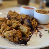 Satay skewers at Alice & Friends at The Glen in Glenview