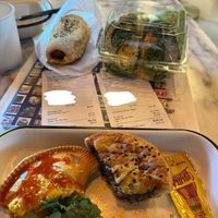Unique veg options! Clockwise: Beyond protein sausage roll, chickpea wrap, Beyond protein aussie meat pie, curry pie. They also have avocado toast and to-go salads, hummus, etc. at The Dez Fine Food in Joshua Tree
