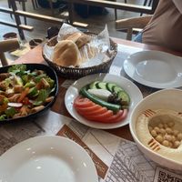Fattoush, mixed veg, hummus  at Sabah W Masa - Porto Arabia branch in Doha