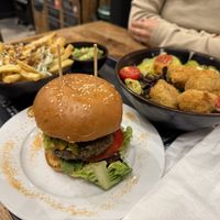 Burger, fries, and salad  at Alma Vegan Food in Santiago