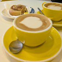 Oat cappuccino and oat flat white (not much difference?) plus vegan cinnamon roll at How About Coffee in Lisbon