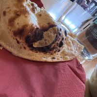 Vegan butter naan  at Namaste Village - Twickenham in Twickenham