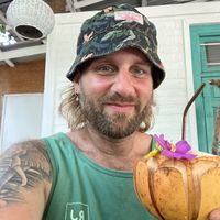 this is happy me with a ice cool coconut  at Spa Una & Eco Café in Unawatuna