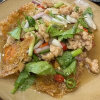 Fried “egg” spicy salad  at Kem-Kon Pahurat (เข้ม-ข้น พาหุรัด) in Bangkok