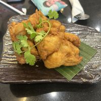 Fried oyster mushrooms   at Kem-Kon Pahurat (เข้ม-ข้น พาหุรัด) in Bangkok