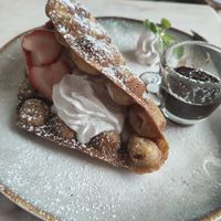 Strawberry waffle with whipped cream and ice cream at Kem-Kon Pahurat (เข้ม-ข้น พาหุรัด) in Bangkok