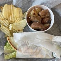 Greek Salad Gyro with roasted potatoes and chips   at Taziki's Mediterranean Cafe in Mobile