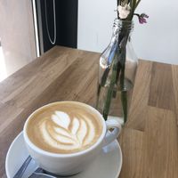 Flat white with oat milk  at Café Passaporte  in Porto