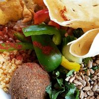 Bhima bowl with falafel, papadam, pakora and millet at Goura Pakora in Berlin