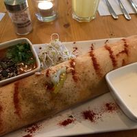 Peanut dosa with a side of lentil soup at Goura Pakora in Berlin