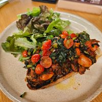 Beans on toast, asked for tomatoes and greens to be added at FarmED in Chipping Norton