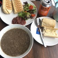 Cheese panini, mushroom soup, pink tea, orange pop  at Pip & Oat in Llandudno