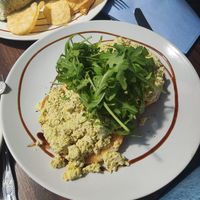 Scrambled tofu on bagel at Pip & Oat in Llandudno