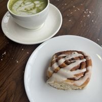 Cinnamon Roll and Matcha Tea  at Pip & Oat in Llandudno