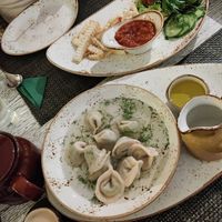 Koldunai starter and celery fries with salad at Vegafe - Totoriu g. in Vilnius