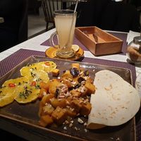 Trio of tofu aubergine potatoes with ginger tea at Vegafe - Totoriu g. in Vilnius