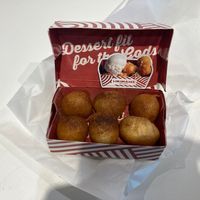 Box of Lukamades at ATH - Lukumades in Athens
