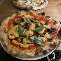 Vegan pizza with basil, aubergine and various veggies   at Pizzeria MaMeMí in Copenhagen