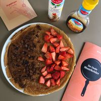 Vegan & gluten-free traditional Dutch pancake with rum raisins and strawberries  at De Muntkelder in Utrecht