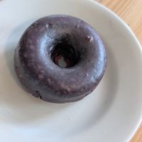 Vegan chocolate pomegranate blueberry  at Knead Doughnuts in Providence