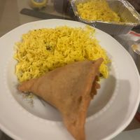 Lemon rice and samosa  at Shiva Take Away in Padua