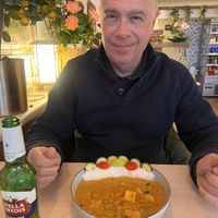 Hubby had the Indian curry with brown rice… see that happy face!   at Loving Vegan  in Hafnarfjordur