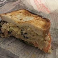 Vegan Chickpea “chicken” salad sandwich on toasted gluten free bread. Delicious  at Urban Deli in Savannah