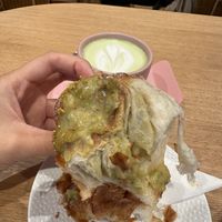 The insides + matcha latte  at Elias Coffee Shop in Prague