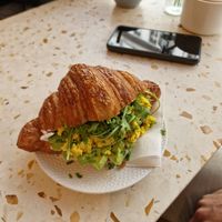croissant with scrumbled tofu at Elias Coffee Shop in Prague