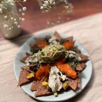 Loaded Black bean nachos with all house made sauces at Greenr in Panaji