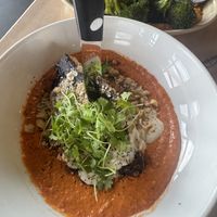 Roasted cabbage with muhamarra and duqqa  at Safta in Denver
