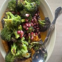 Charred broccoli with pumpkin and pomegranate   at Safta in Denver