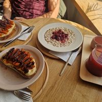 Humus toast and porridge at TIDEN in Minsk