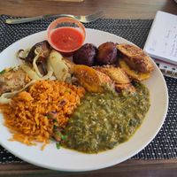 Jollof rice, supa, kelewele, puff puff & suya shrooms at Fankaasoo  in Groningen