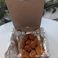 Plant based chick'n with hot honey sauce at Pizza Nova - Church St in Toronto