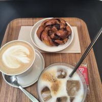 Cappuccino iced coffee and cinnamon bun at MoMu Café in Antwerpen