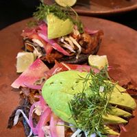 Panuchos, tofu skewers in background  at Los Loosers in Mexico City
