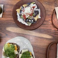 Enfrijolados y pan tostado a la Gómez (named after two cats!)  at Los Loosers in Mexico City